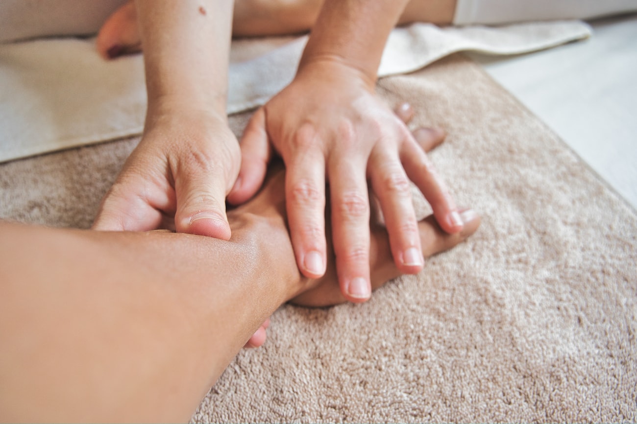 Scott giving a hands-on sports massage at a client's accommodation